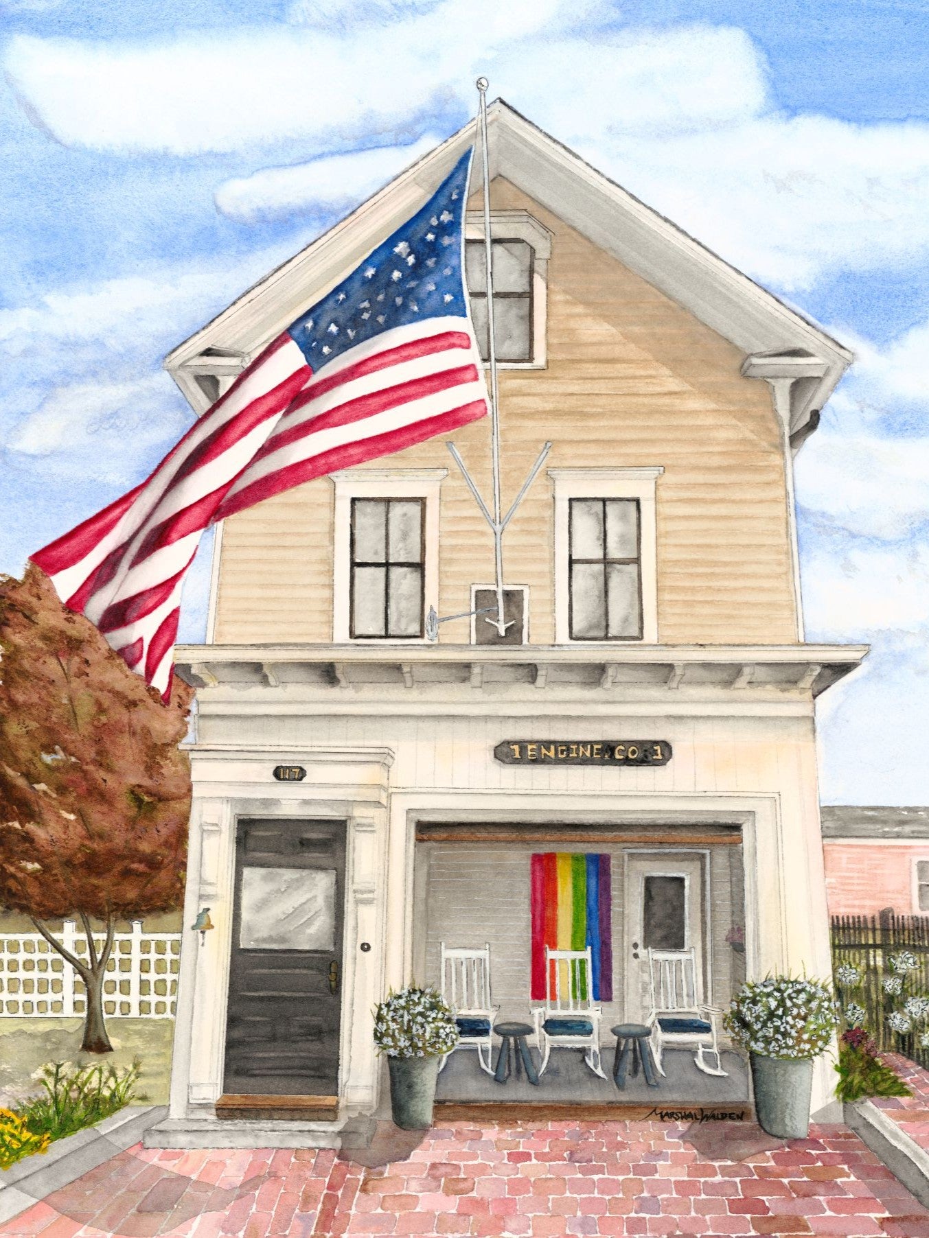 A detailed close-up photograph showing the textured surface of the limited edition fine art print "Firehouse Pride" by Marshal Walden. The image reveals the grain of the archival fine art paper and the intricate ink details of the waving American flag and the Pride flag displayed at the historic Provincetown Engine Co. 1 firehouse under a bright sun.
