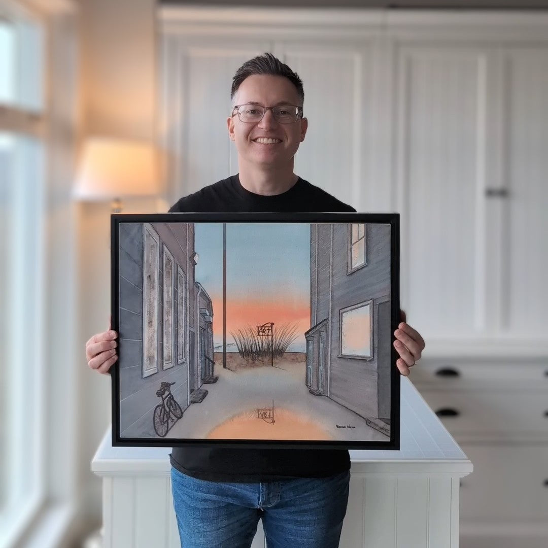 A photo of the artist Marshal Walden holding a 16x20 inch reference commission to demonstrate scale for custom wall art, helping customers visualize size options before ordering.